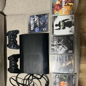 Ps3 perfect working condition/ smoke free home, 2 controllers and 6 games